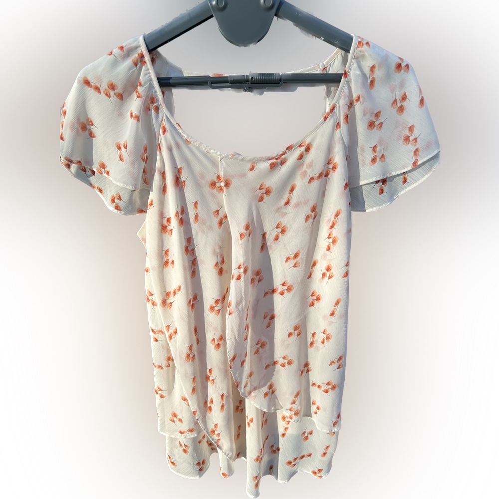 Cream and orange flowered tulip blouse